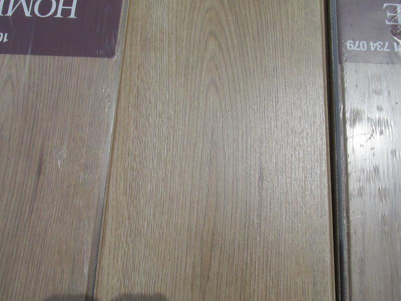 Montego Oak 8 mm Thick x 7-2/3 in. Wide x 50-5/8 in. Length Laminate Flooring (21.48 sq. ft. / case)