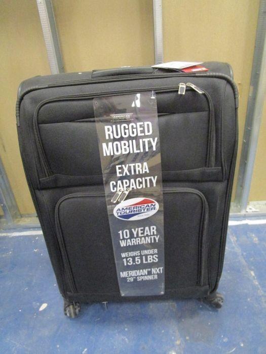 american tourister meridian nxt 29 spinner